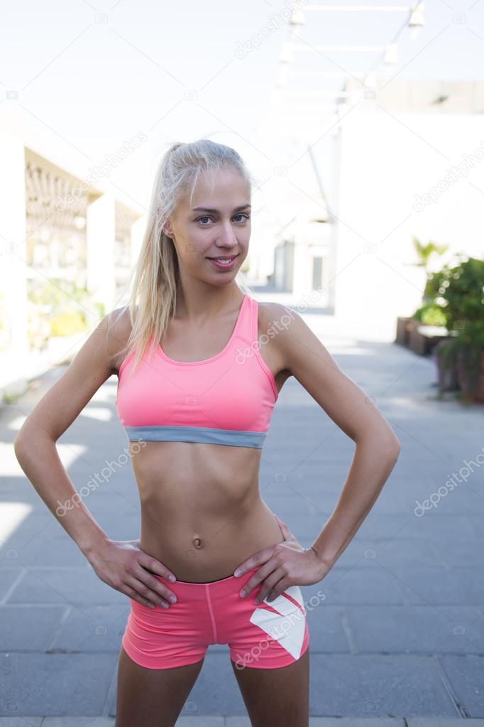 Young fitness woman relaxing after a workout