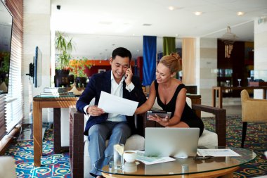 Business people preparing for the conference