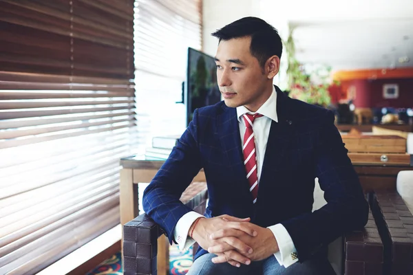 Asian businessman resting after hard work — Stok fotoğraf