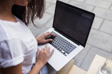 Young student girl working on net-book
