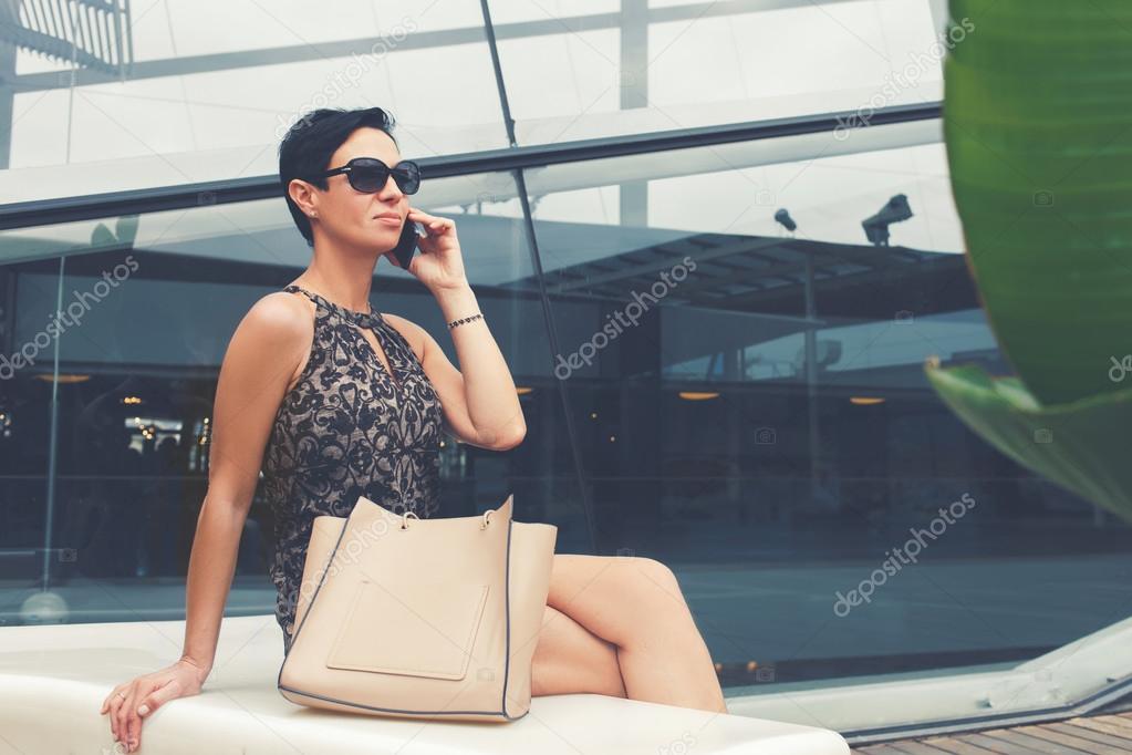 Elegant businesswoman talking on mobile phone
