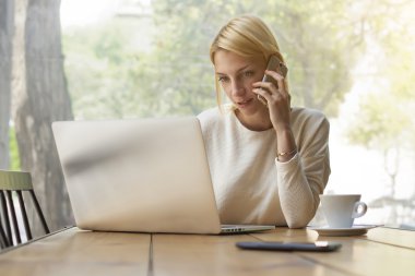 Woman busy working in modern office