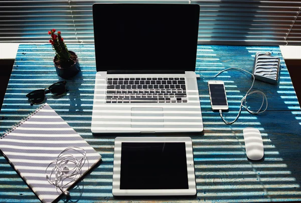 Modern freelance desktop with accessories and distance work tools ...