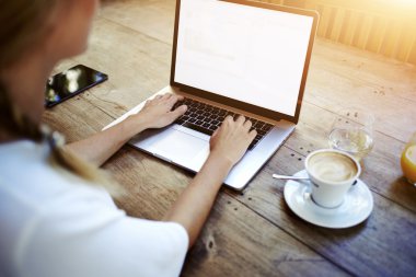 Young woman working on net-book