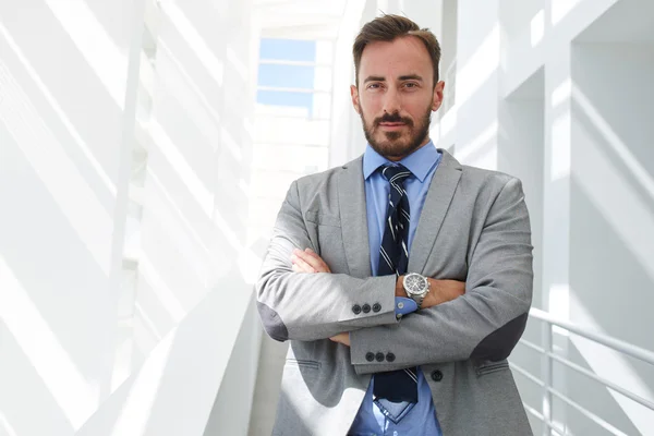 Man lawyer standing with crossed arms