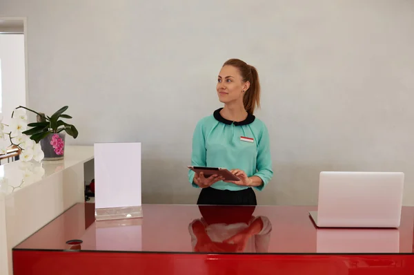 Woman working on touch pad in store — 스톡 사진