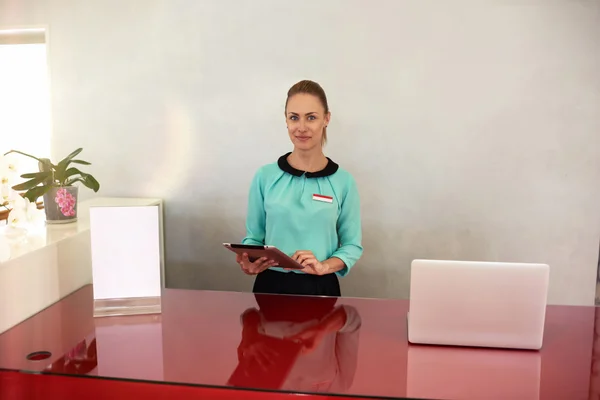 Woman working on touch pad in store — 스톡 사진