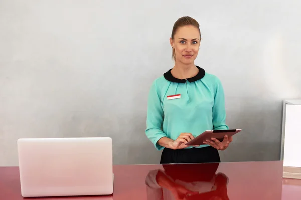 Woman working on touch pad in store — 스톡 사진