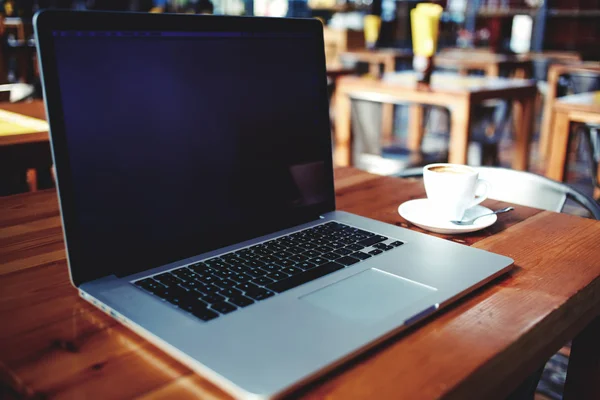 Open laptop computer with space for brand — Stockfoto