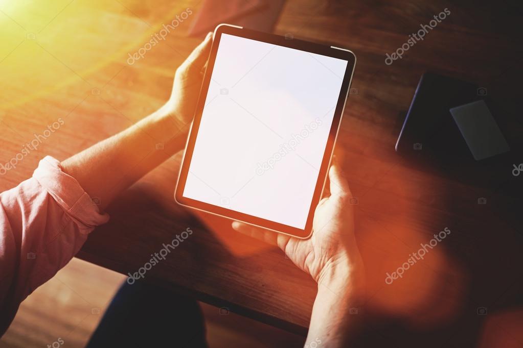 Man's hands working on touch pad