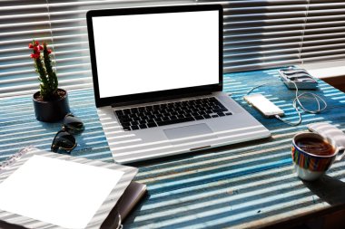 Work space with laptop computer and tablet