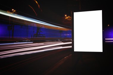 Blank billboard with night city on background