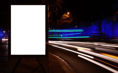 Blank billboard with night city on background