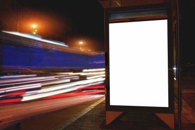 Blank billboard with night city on background