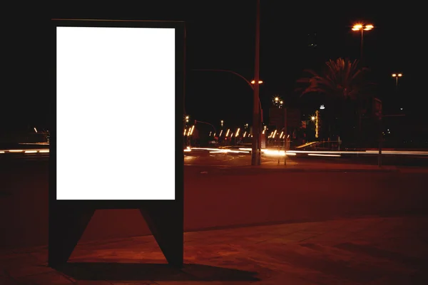 Blank billboard with night city on background — Stock Fotó