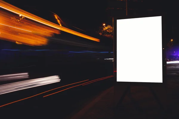 Blank billboard with night city on background — 스톡 사진