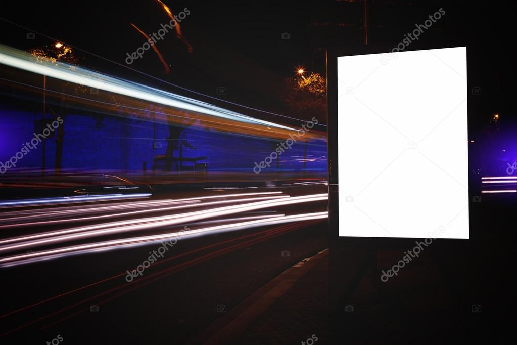 Blank billboard with night city on background