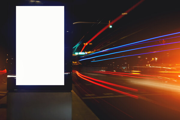 Blank billboard with night city on background