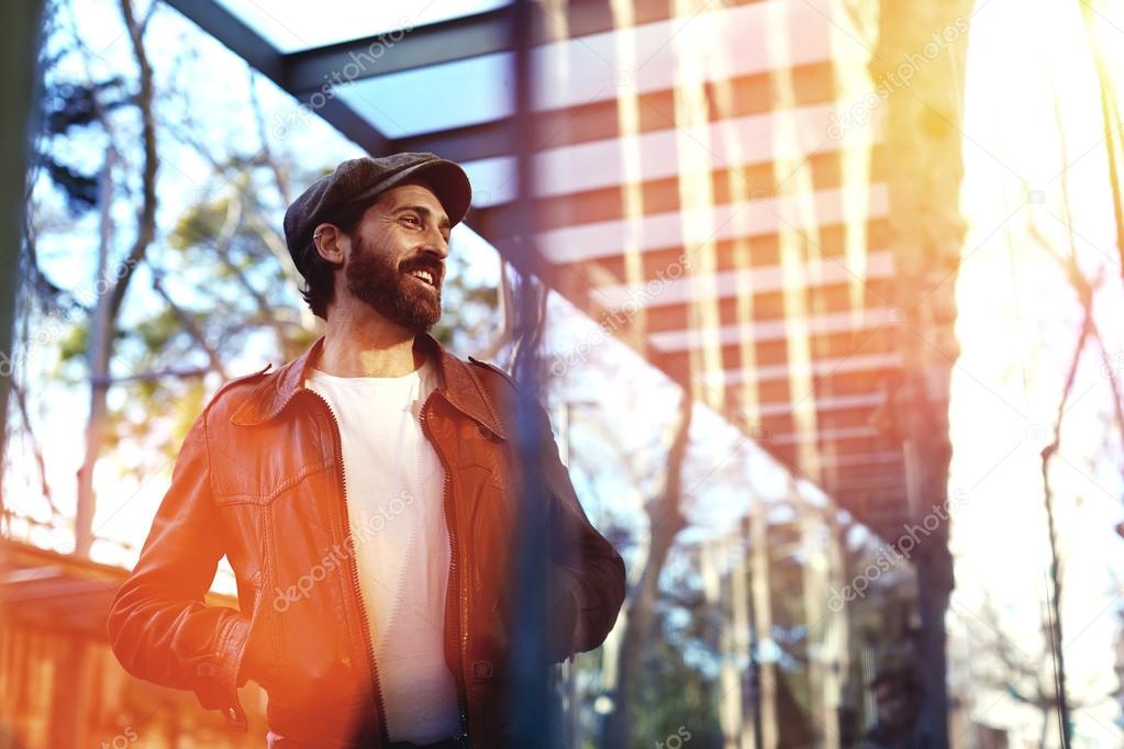 Handsome bearded man posing for the camera