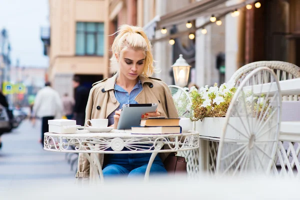 Attractive woman working on touch pad — Stock Photo, Image