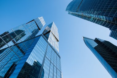 Business skyscrapers against blue sky