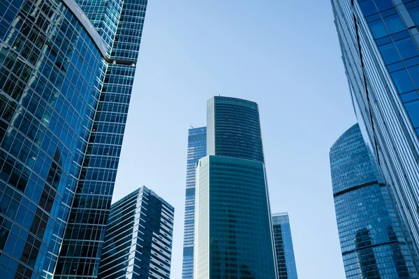 Business skyscrapers against blue sky — стокове фото