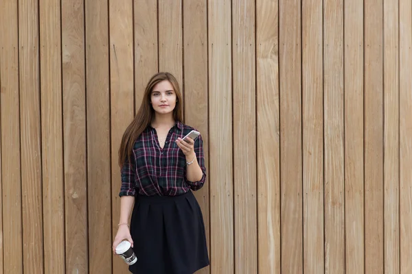 Trendy woman using mobile phone — Stock Photo, Image