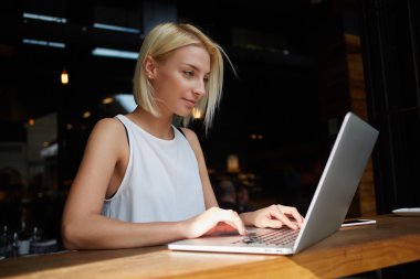 Elegant businesswoman working on laptop computer