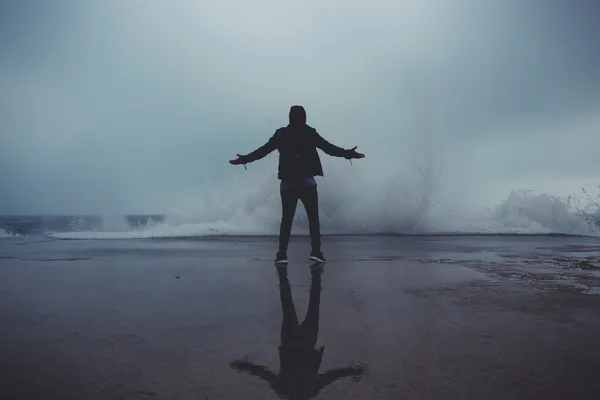 Rear view of man standing on the pier — ストック写真