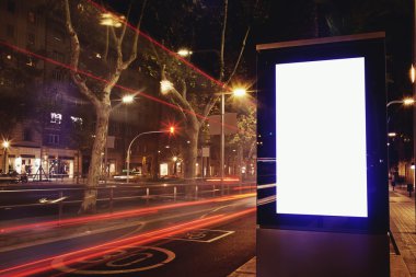Illuminated blank billboard with copy space