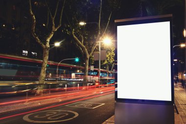 Illuminated blank billboard with copy space
