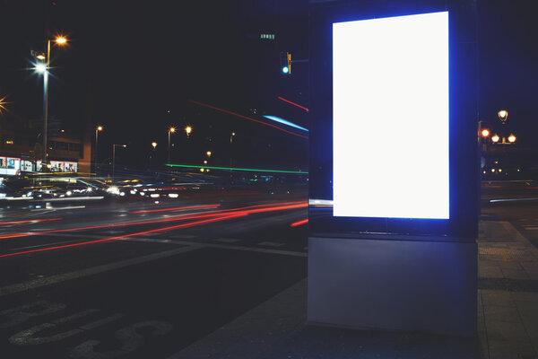 Illuminated blank billboard with copy space