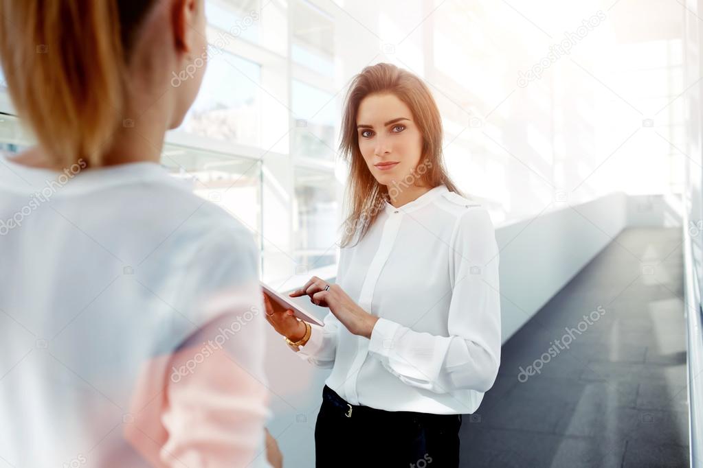businesswomen in modern office interior