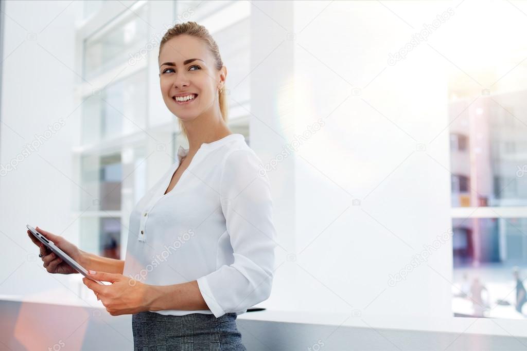 businesswoman holding digital tablet in hands
