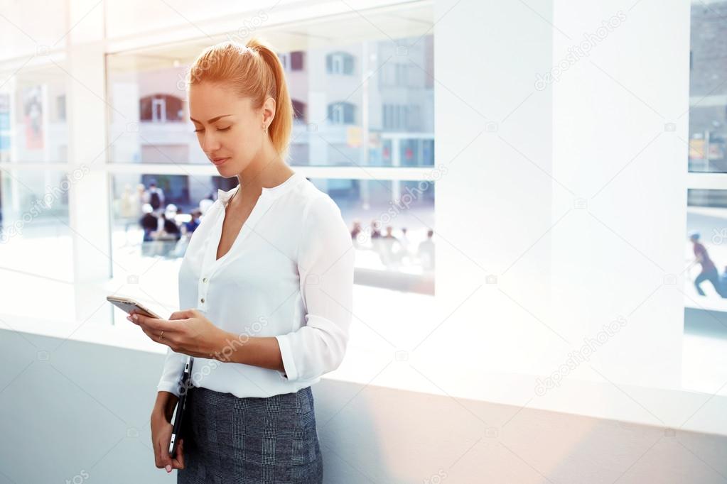 businesswoman with touch pad in hands
