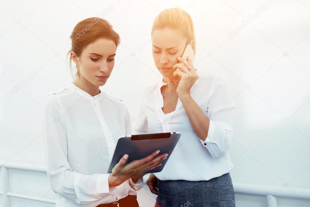 two women entrepreneurs preparing for meeting