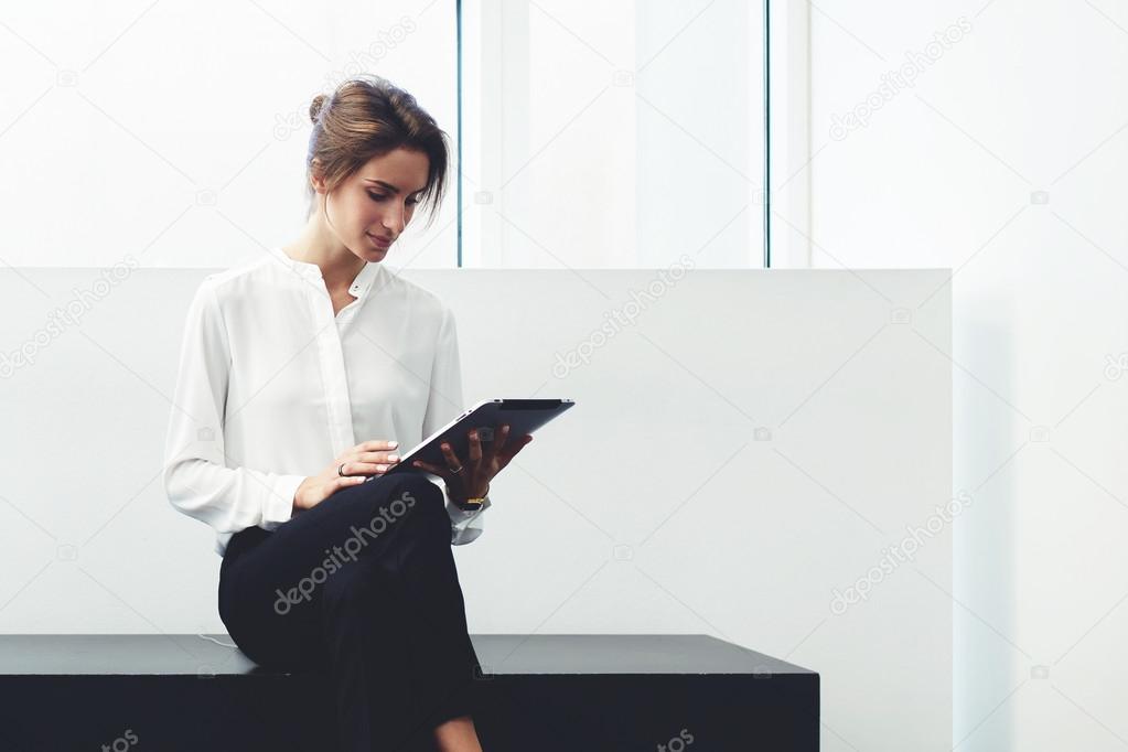 businesswoman working on touch pad