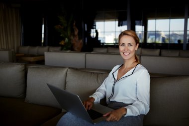 beautiful female working on net-book