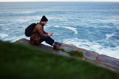 stylish hipster guy with cell telephone