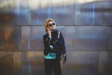 woman having mobile phone conversation