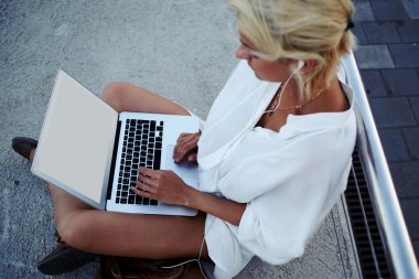 girl keyboarding on portable net-book