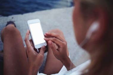 hipster girl chatting on cell telephone