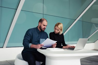 man and woman entrepreneurs working together