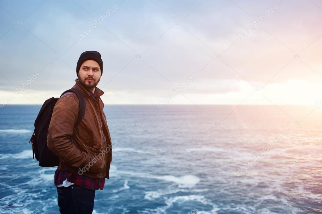 stylish hipster guy enjoying vacations