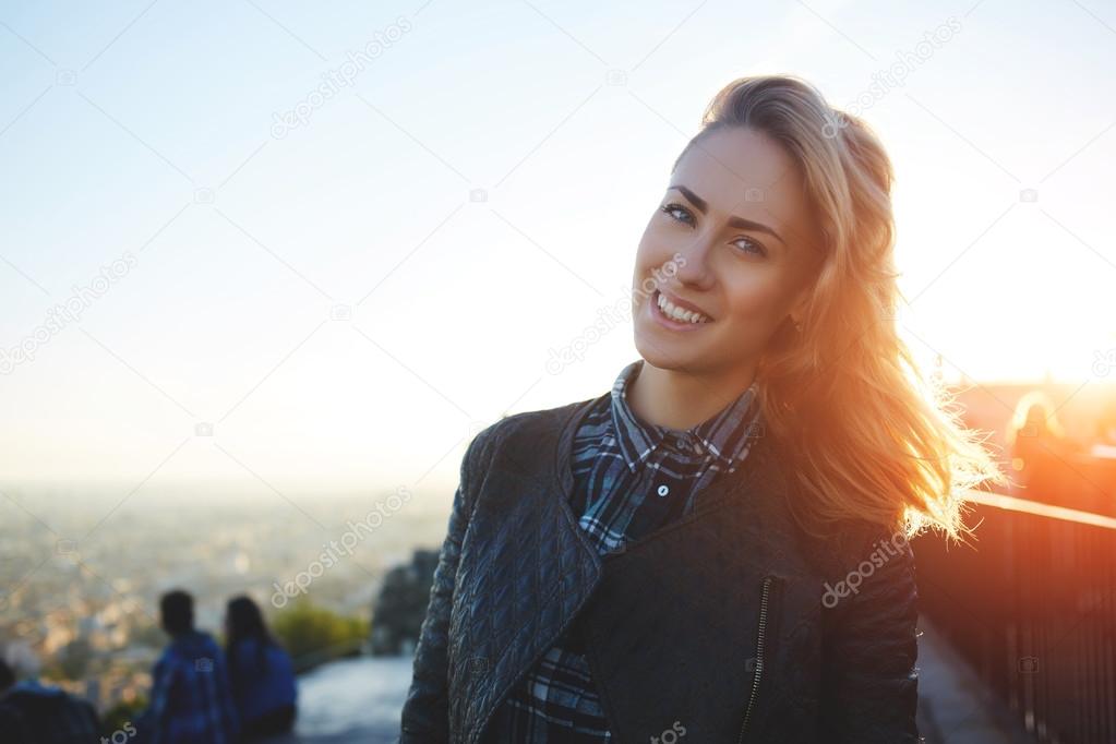 Woman standing on a roof