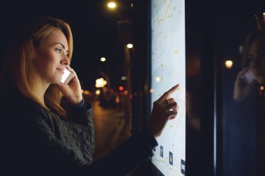 woman tourist talking on mobile phone