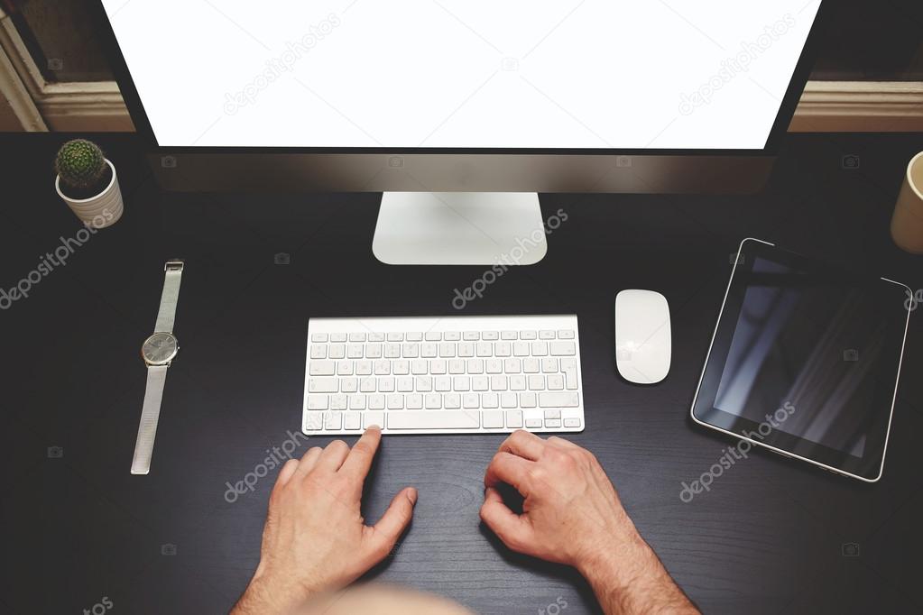 male hands using wireless keyboard
