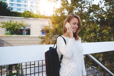 woman tourist talking on mobile phone