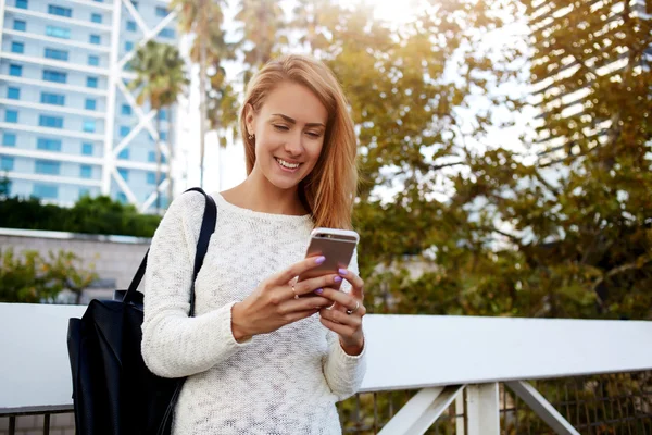 Hipster girl watching funny video — Stock Fotó