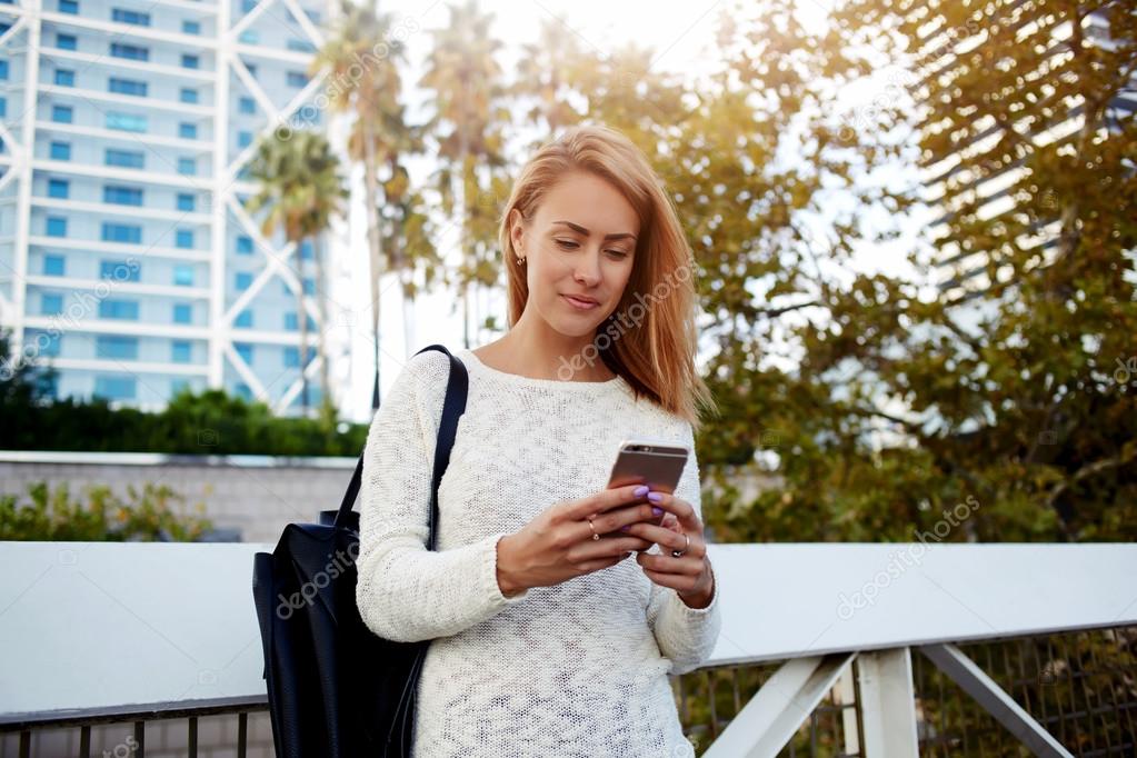 woman reading text message